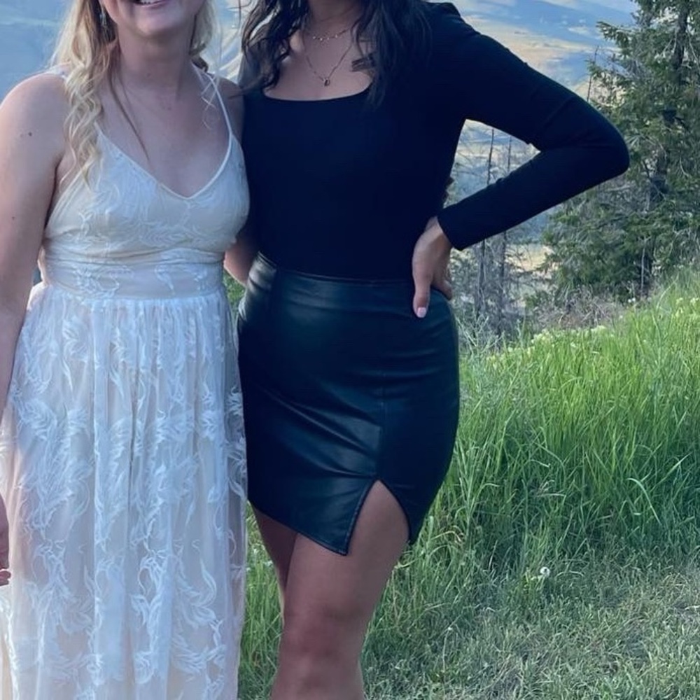 Black faux leather mini skirt